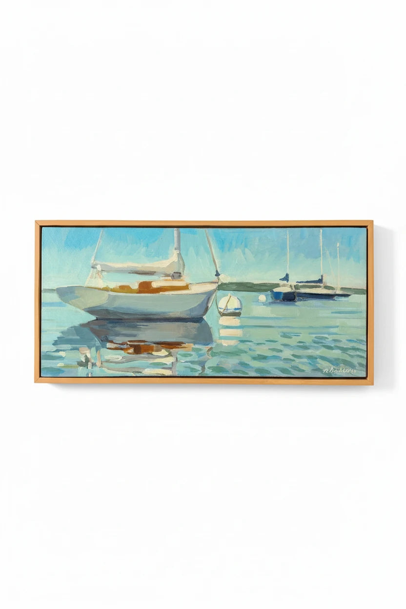 Framed painting of sailboats on a calm water surface.