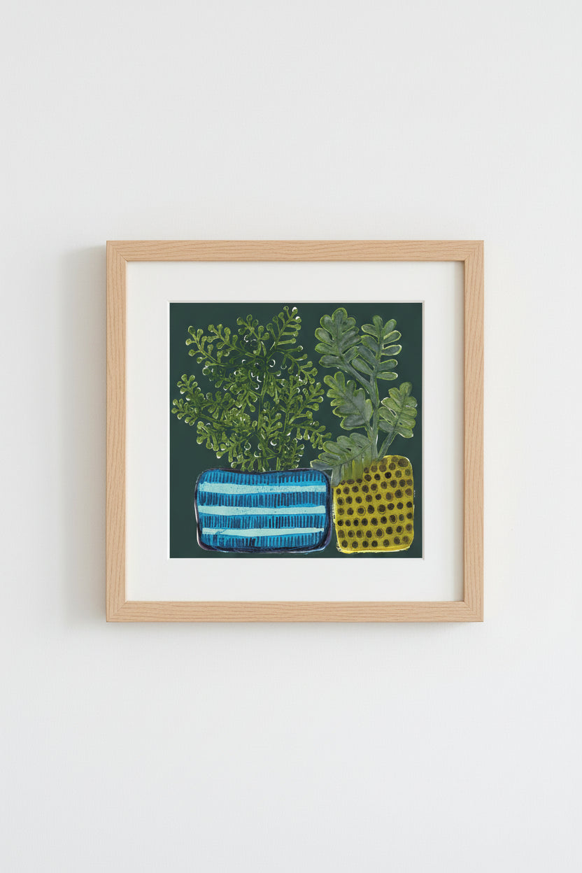 Two decorative plant pots with green foliage on a dark background